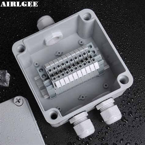 uxcell 170mmx140mmx95mm 1 inlet to 2 outlet waterproof junction box|White ABS 12 Holes Dustproof IP65 Enclosure Junction Box.